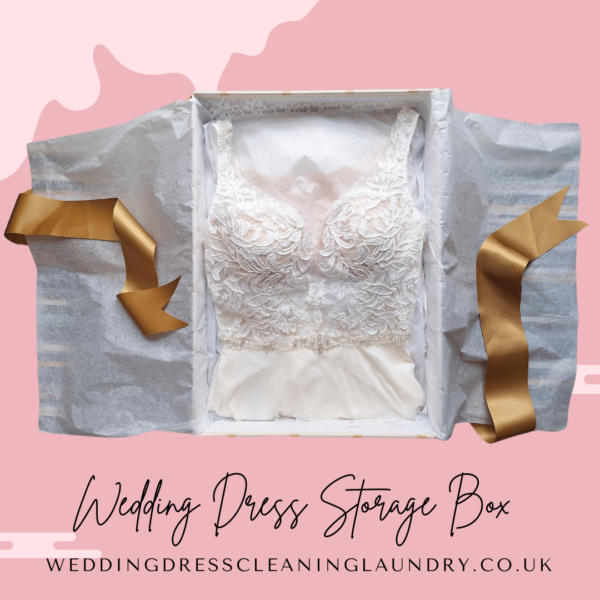 A white acid-free box with a wedding dress inside, suitable for long-term preservation.