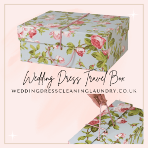 Handmade wedding dress travel box with acid-free tissue and cord handle.